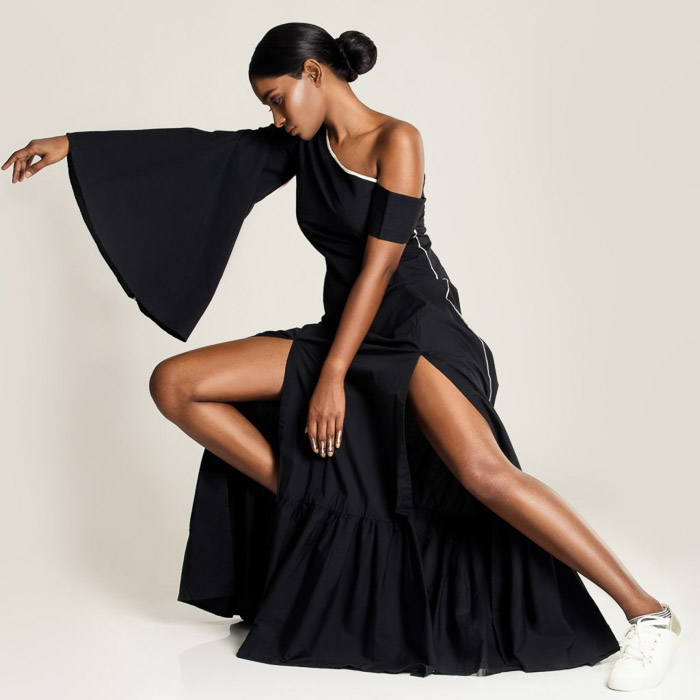高级时尚拍摄的黑色礼服的股份模型 - 时尚摄影类型